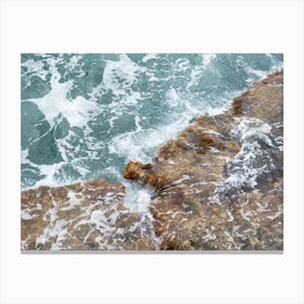Rocky shore, waves and blue sea water Canvas Print