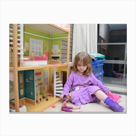 Little Girl Playing With Doll House Canvas Print