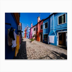 Colourfully Painted Houses With Laundry Put Up On Washing Lines On The Island Of Burano Canvas Print