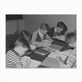 Children Of Workmen At The Umatilla Ordnance Depot Attend School In Basement Of Church, Use Long Tables A Canvas Print