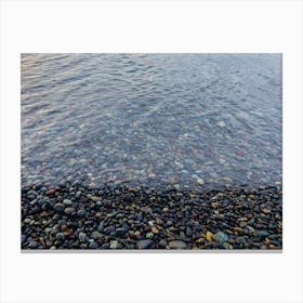 water flowing over pebbles Canvas Print