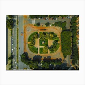 City park surrounded by roads and tram tracks photo from a drone Canvas Print