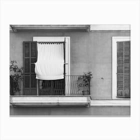 Balcony and rustic window shutters of old mediterranean house Canvas Print