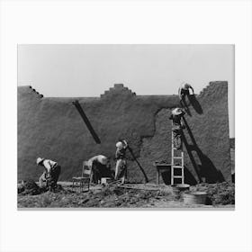 Spanish American Women Replastering An Adobe House, This Is Done Once A Year, Chamisal, New Mexico By Russell Canvas Print
