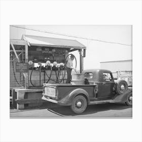 Member Of The United Producers And Consumers Cooperative Having A Drum Filled With Gasoline At The Warehouse Canvas Print