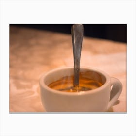Cup Of Hot Coffee With Spoon In It With Smoke Canvas Print