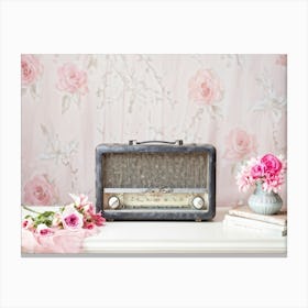 Antique Portable Radio Adorned With Flowers Radiating A Soft Pink And Grey Palette Enveloped In A Canvas Print