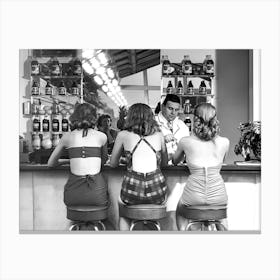 Young Women Sitting at Bar, Bat Cart Decor, Vintage Black and White Old Photo Canvas Print