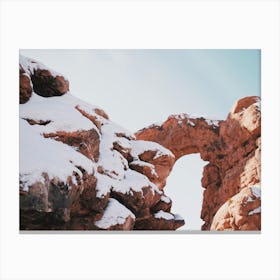 Snowy Desert Arches Canvas Print