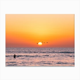 Surfer And Seagulls At Sunset Canvas Print