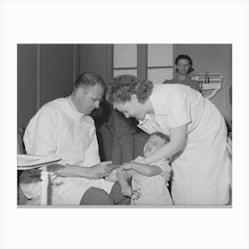 Doctor And Nurse Give Daughter Of Farm Worker Tick Fever Serum At The Fsa (Farm Security Administration) Labor Canvas Print