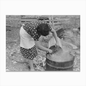 Untitled Photo, Possibly Related To Spanish American Fsa (Farm Security Administration) Client Emptying Pail Of 1 Canvas Print