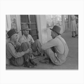 Farmers Sitting Against Wall And Squatting On Sidewalk, Spur, Texas By Russell Lee Canvas Print