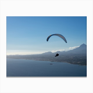 Paragliding over the blue Mediterranean Sea Canvas Print