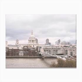 London, England I Skyline view of Saint Paul's Cathedral Millennium Bridge over River Thames from the Tate Modern museum for a grey urban landscape panorama photography in the Londoner rain Canvas Print