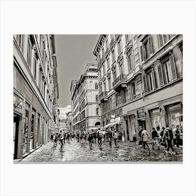 Bustling Streets of Florence. A monochromatic view of a lively street in Florence, Italy, where people stroll past historic buildings and shops. The scene captures the timeless charm and energy of Florence’s architecture and city life. Canvas Print