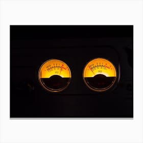 Analog Vu Meters Glowing On Black Background Canvas Print