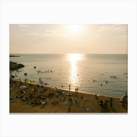 People enjoying Italian beach at sunset | Monopoli | Italy Canvas Print