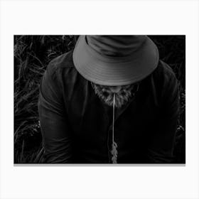 Black And White Photo Of A Man Wearing A Panama With A Spike. Canvas Print