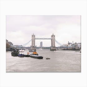 London, England I Grey panoramic skyline view photography of the famous Tower Bridge and the River Thames to the Victorian architecture and British charm of an urban city landscape under rainy weather Canvas Print