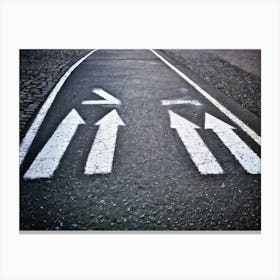 Chalk Drawn Directional Arrows And Markings Bold And Simple On An Aged Sidewalk Surface Partially (5) Canvas Print