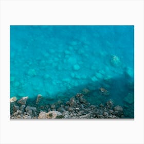 Turquoise sea and rocks Canvas Print