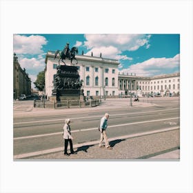 Two People Crossing The Street In Berlin Canvas Print