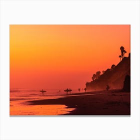 Surfers On The Beach During Evening Warmth Canvas Print