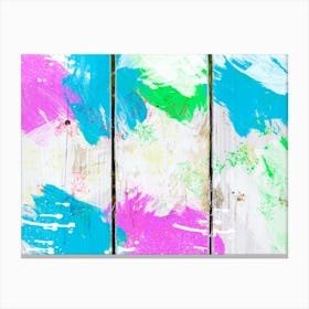 Colorful Paint Splatters On Wooden Fence Canvas Print