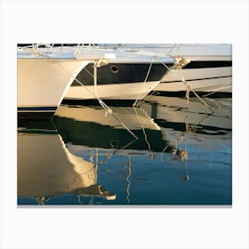 Reflection of yachts moored in the marina Canvas Print