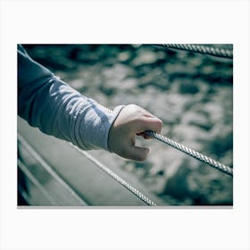 Young Boy Hand Holding Metal Wire Fence Canvas Print