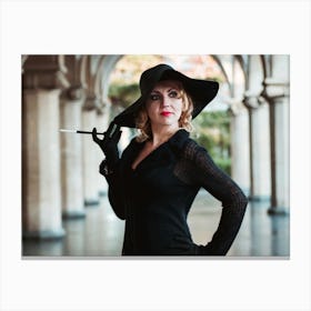 Woman In A Black Hat Canvas Print