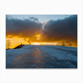 Sunset Over A Frozen Lake Canvas Print