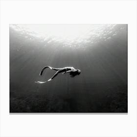 Graceful Woman Snorkeling In Ocean Canvas Print