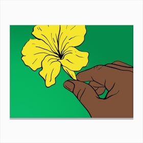 Hand holding a yellow rose on a green background Canvas Print