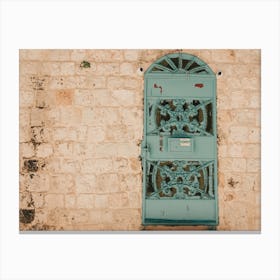 Iron Door In Brick Wall In Tel Aviv Canvas Print