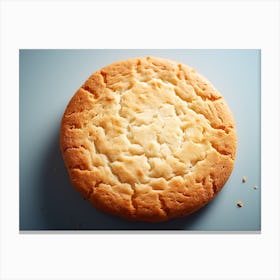 Biscuit On A Blue Surface Canvas Print