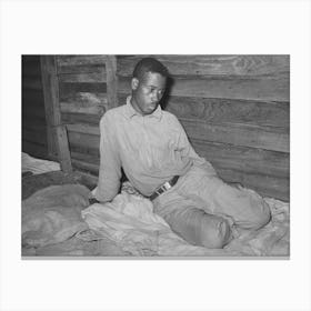 Strawberry Worker Sitting On His Bunk In Bunkhouse, Hammond, Louisiana By Russell Lee Canvas Print