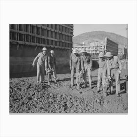 Untitled Photo, Possibly Related To Workmen Using Viberators Which Spread The Wet Concrete In Construction Of Canvas Print