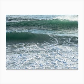 Waves and foaming sea water Canvas Print