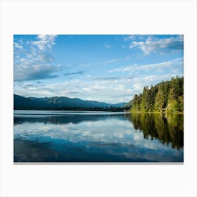 Clouds Reflecting On Lake Canvas Print
