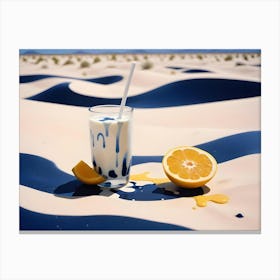 A Glass Of Milk With Blue Swirls And A Slice Of Orange Sitting On A Light Colored Surface With A Blue Liquid Surrounding It Canvas Print