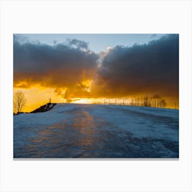 Sunset Over Snow Covered Hill Canvas Print