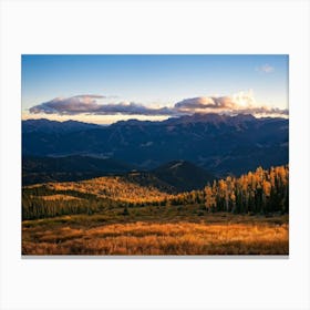 Alpine Landscape Bathed In The Warm Glow Of Autumn Colors Expansive Mountains Stretching Into The H Canvas Print