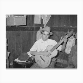 Mexican Boy Playing Guitar In Room Of Corral, Robstown, Texas By Russell Lee Canvas Print
