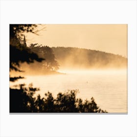 Loon in the morning mist on a lake in Minnesotas Northwoods – Gunflint Lake Sunrise Morning Boundary Waters Canoe Area Minnesota Bwca Canvas Print