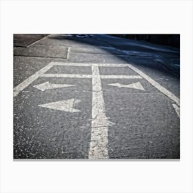 Chalk Drawn Directional Arrows And Markings Bold And Simple On An Aged Sidewalk Surface Partially Canvas Print