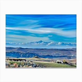 Monviso and Langhe. A breathtaking view of snow-capped Alpine peaks dominating the horizon, with a vibrant rural landscape in the foreground. Rolling fields, vineyards, and charming villages with historic churches create a serene and picturesque scene. The vivid blue sky adds to the tranquility and grandeur of the setting 1 Canvas Print