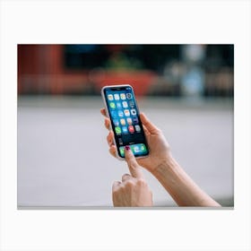 Woman Holding Iphone Canvas Print