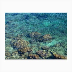Clear blue Mediterranean Sea and rocks Canvas Print